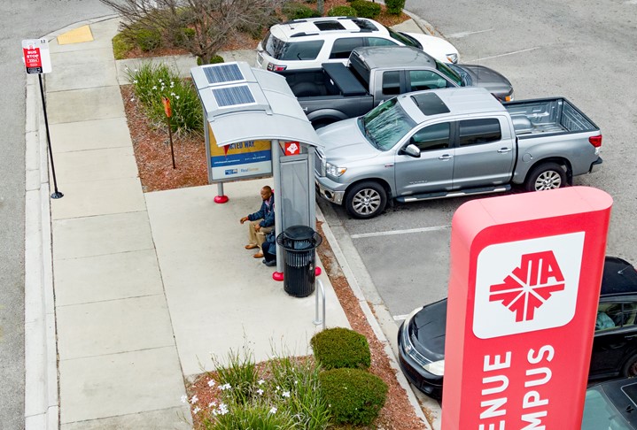 Bus Stop in Parking Lot
