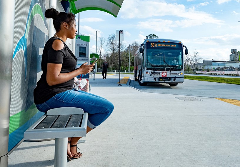 Woman waiting for a bus